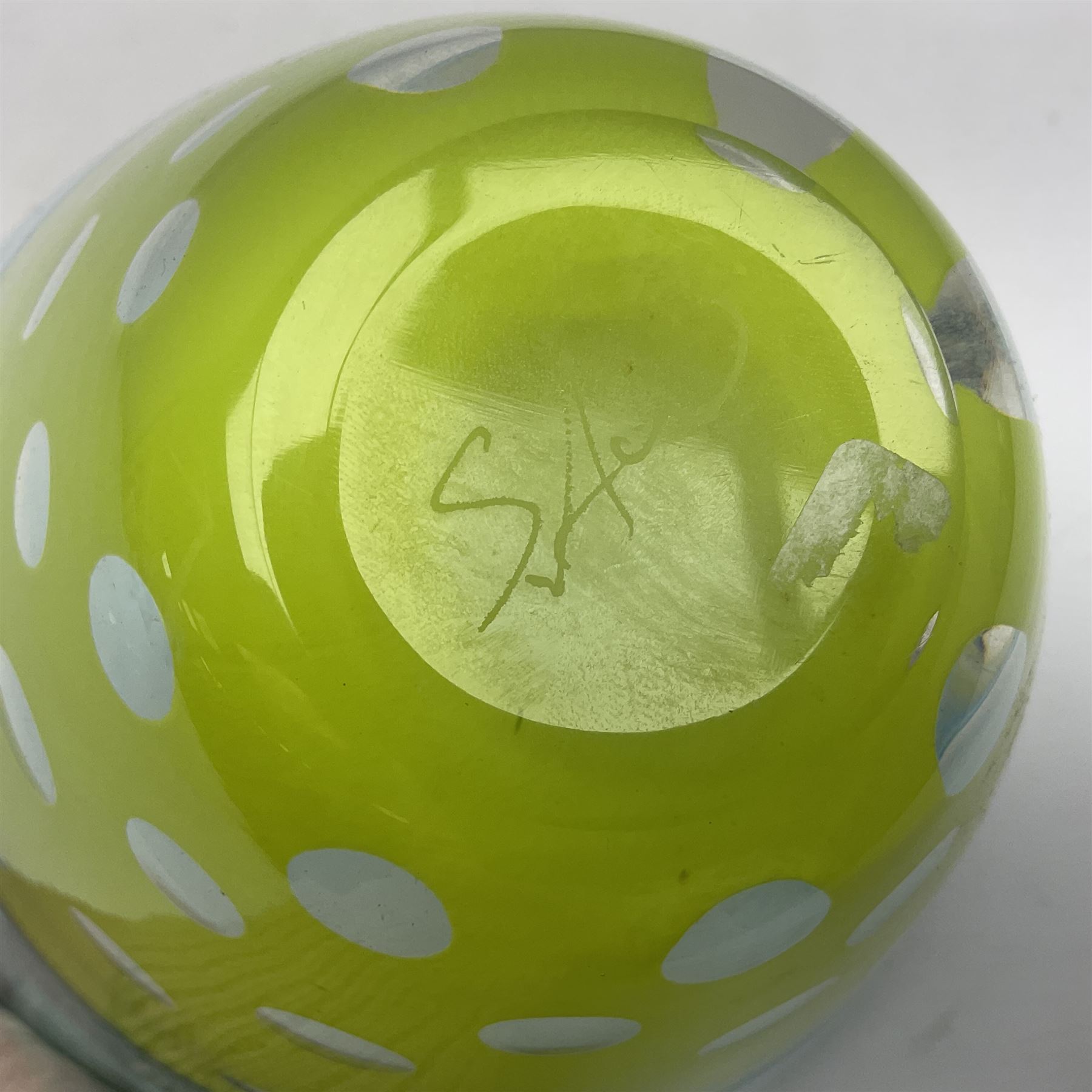 Stuart Akroyd glass vase, blue banded top and lime green opaque lower section with bubble inclusions, with sticker and engraved signature beneath, H15cm