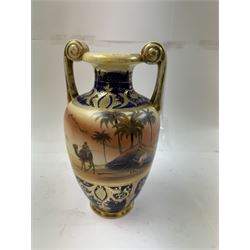 Pair of Noritake twin handled vases, decorated with camel scene, H24cm 