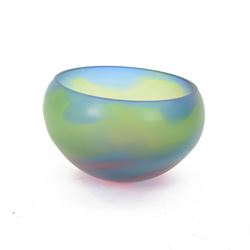 Chris Comins (British b.1954): late 20th century art glass bowl, of circular form with free flowing pink, green and blue decoration, signed C. Comins 95 beneath, H11.5cm, D16.5cm