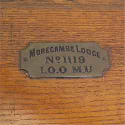 Victorian oak brass bound masonic casket, the cover with plaque engraved 'Morecombe Lodge, No. 1119, 1.0.0. M.U', on four brass lion paw supports, L40cm, H17cm, D30cm