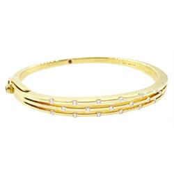 Roberto Coin 'Parisienne' 18ct gold three row round brilliant cut diamond bangle, with a s...