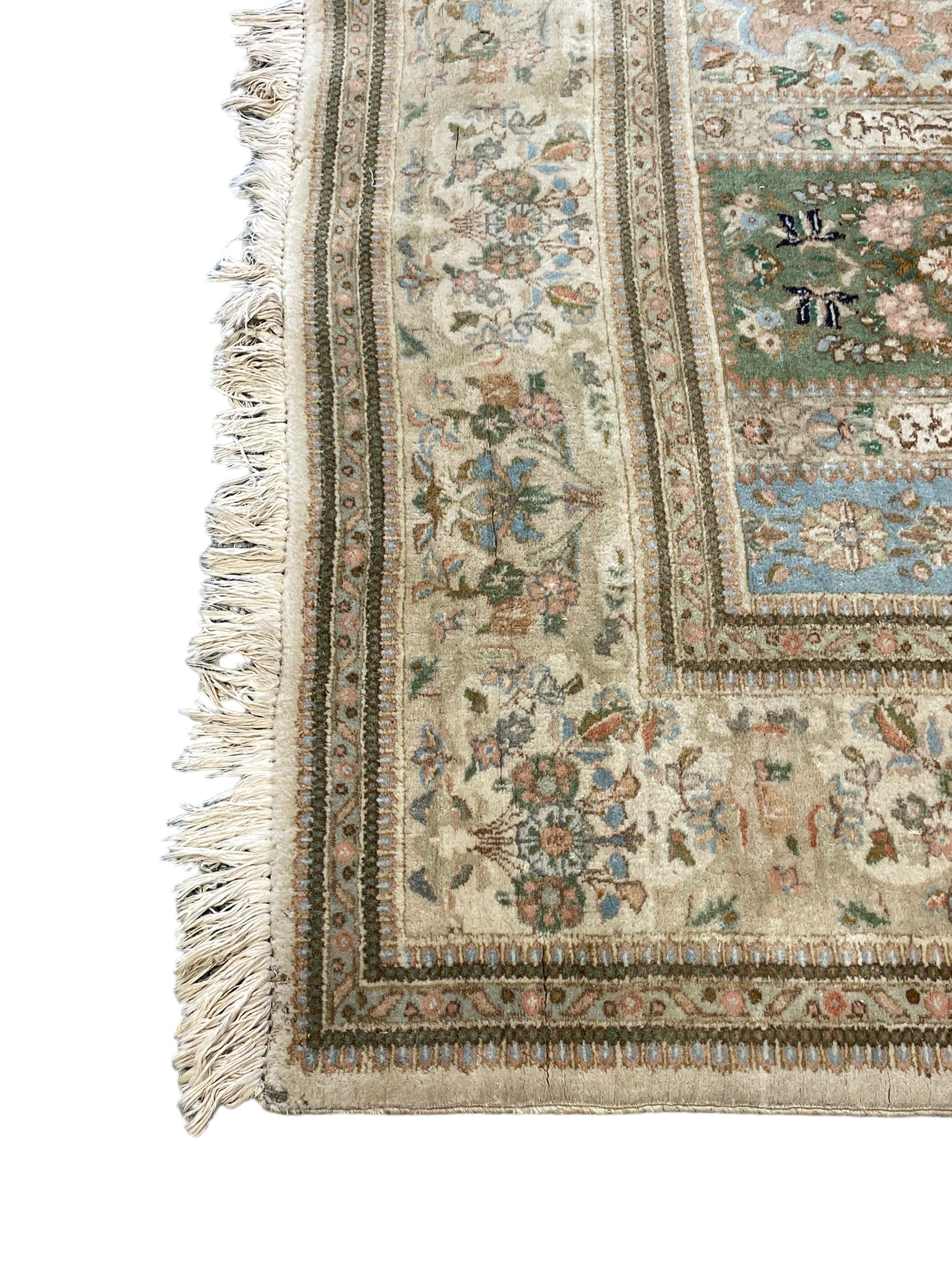 Persian Bakhtiari camel ground garden carpet, the field decorated with square panels containing stylised tree of life and Mirab motifs with birds and animals, with further floral and palmette patterns, the guarded border with repeating bouquets and posies of stylised plant motifs