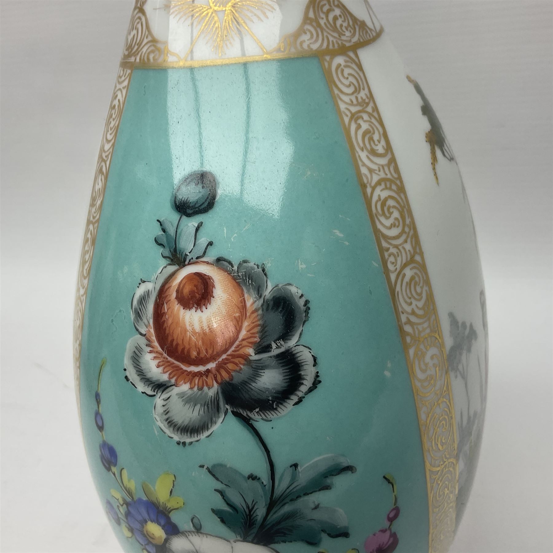 Pair of late 19th century Helena Wolfsohn vases and covers, each of compressed bottle form with tall neck, painted with alternating panels of romantic scenes and floral sprays upon turquoise ground between gilt borders, with Augustus Rex mark to base, H35cm