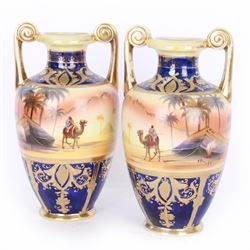 Pair of Noritake twin handled vases, decorated with camel scene, H24cm 