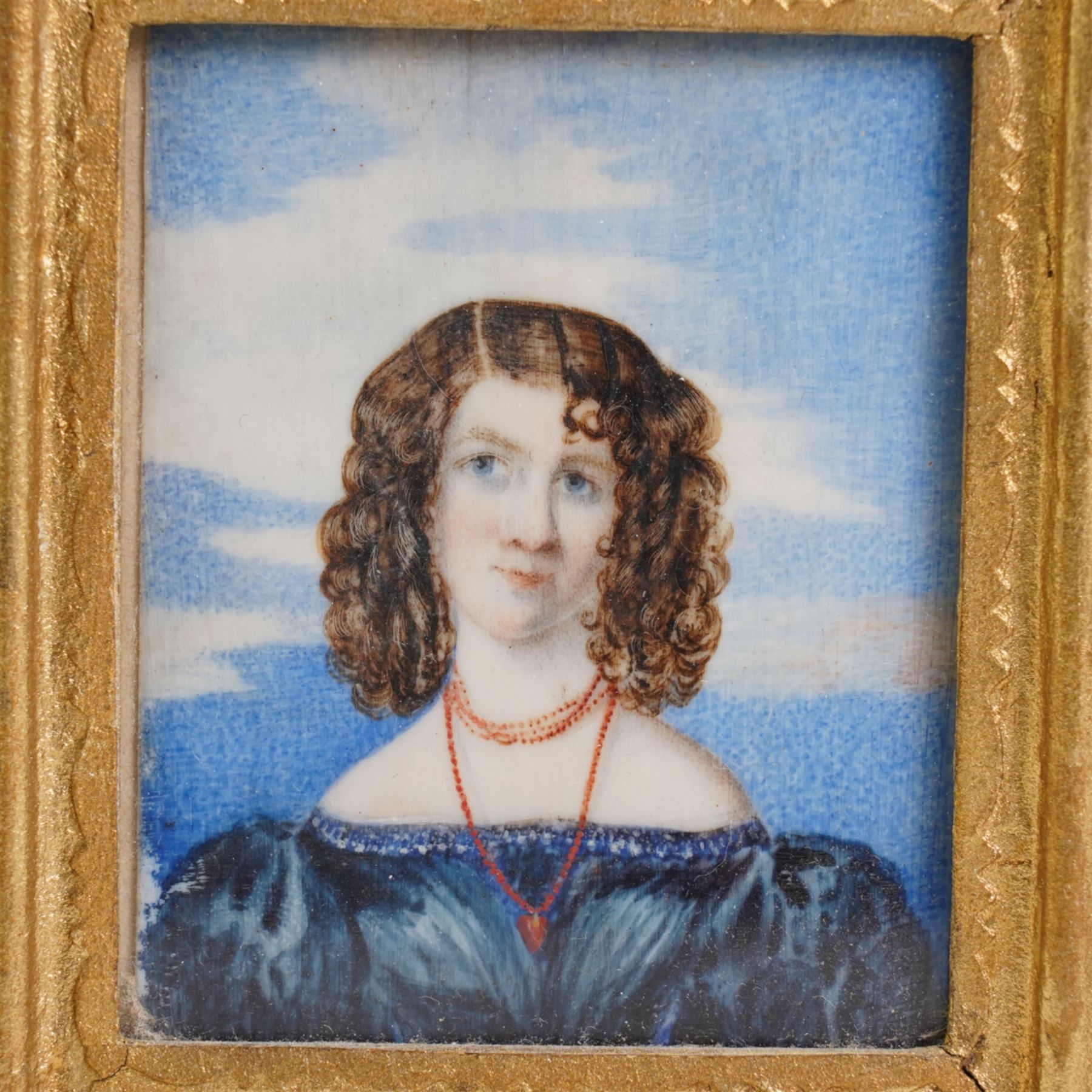 George Felton Buttary (British Early 19th century): Portrait of 'Louisa Taylor Aged 22' wearing a blue gown, miniature watercolour on ivory unsigned, inscribed verso 6.5cm x 5.5cm. This item has been registered for sale under Section 10 of the APHA Ivory Act