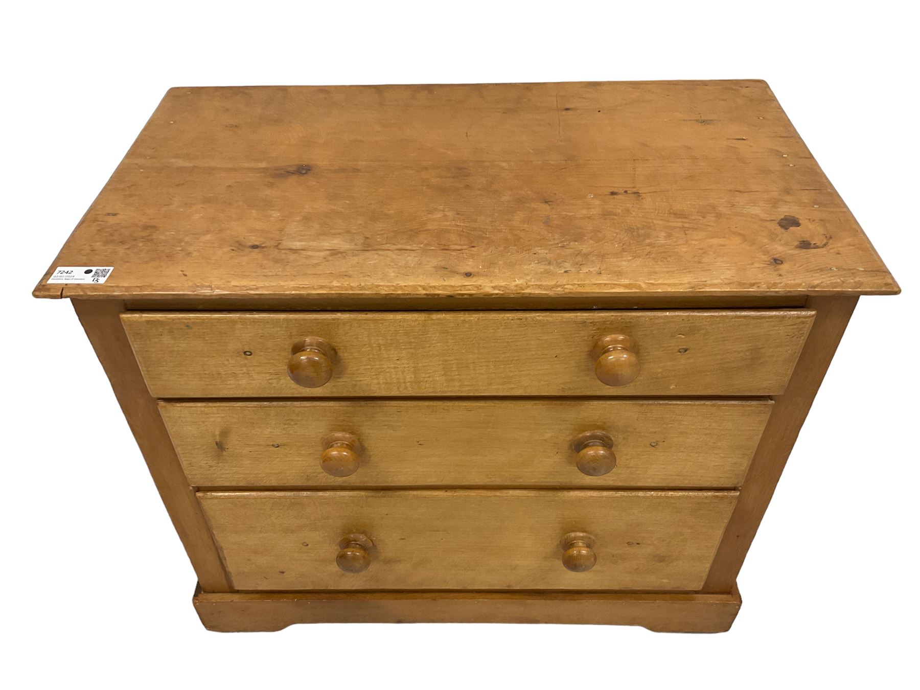 Victorian pine and satinwood chest, fitted with three graduating drawers, on skirted base with castors