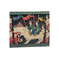 Rectangular relief carved and painted wall hanging panel, depicting ceremonial procession with soldiers and flag bearers on horses and elephants