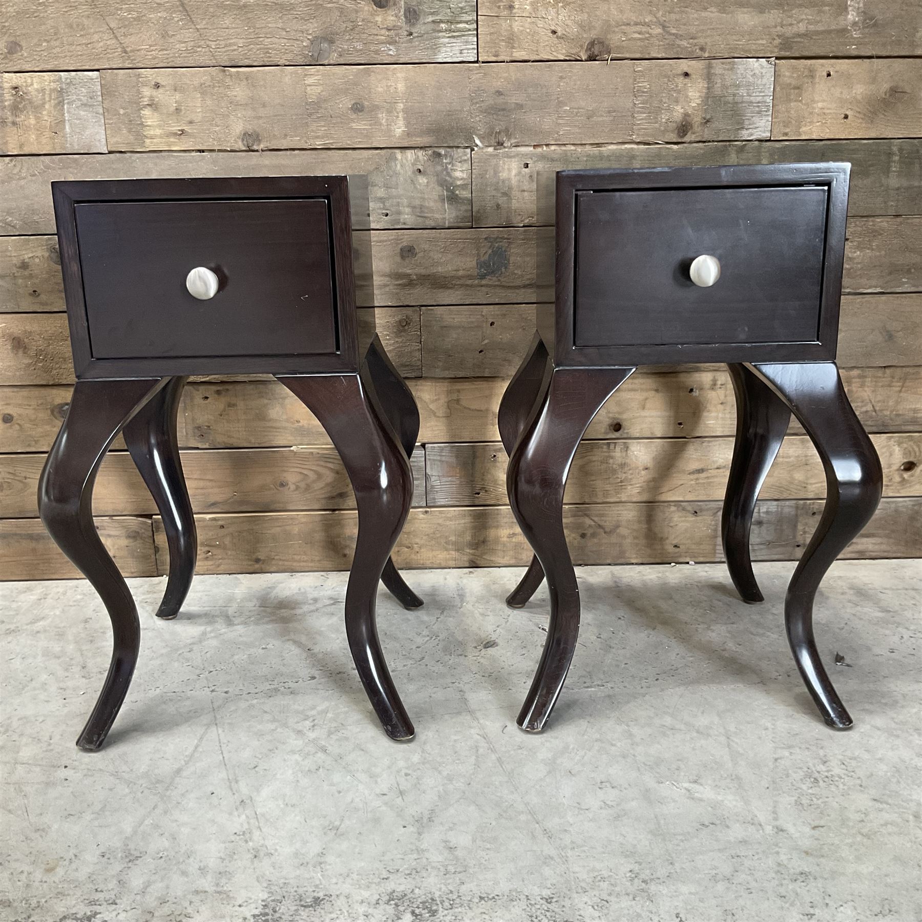 Two small rosewood bedside tables