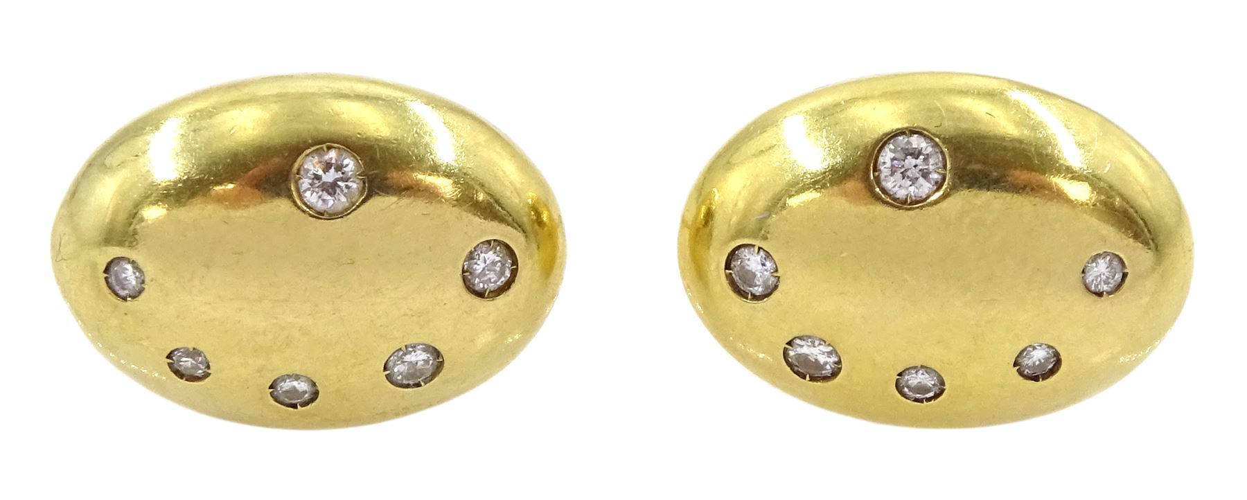 Pair of 18ct gold rubover set round brilliant cut diamond, oval shaped earrings, Sheffield 1996