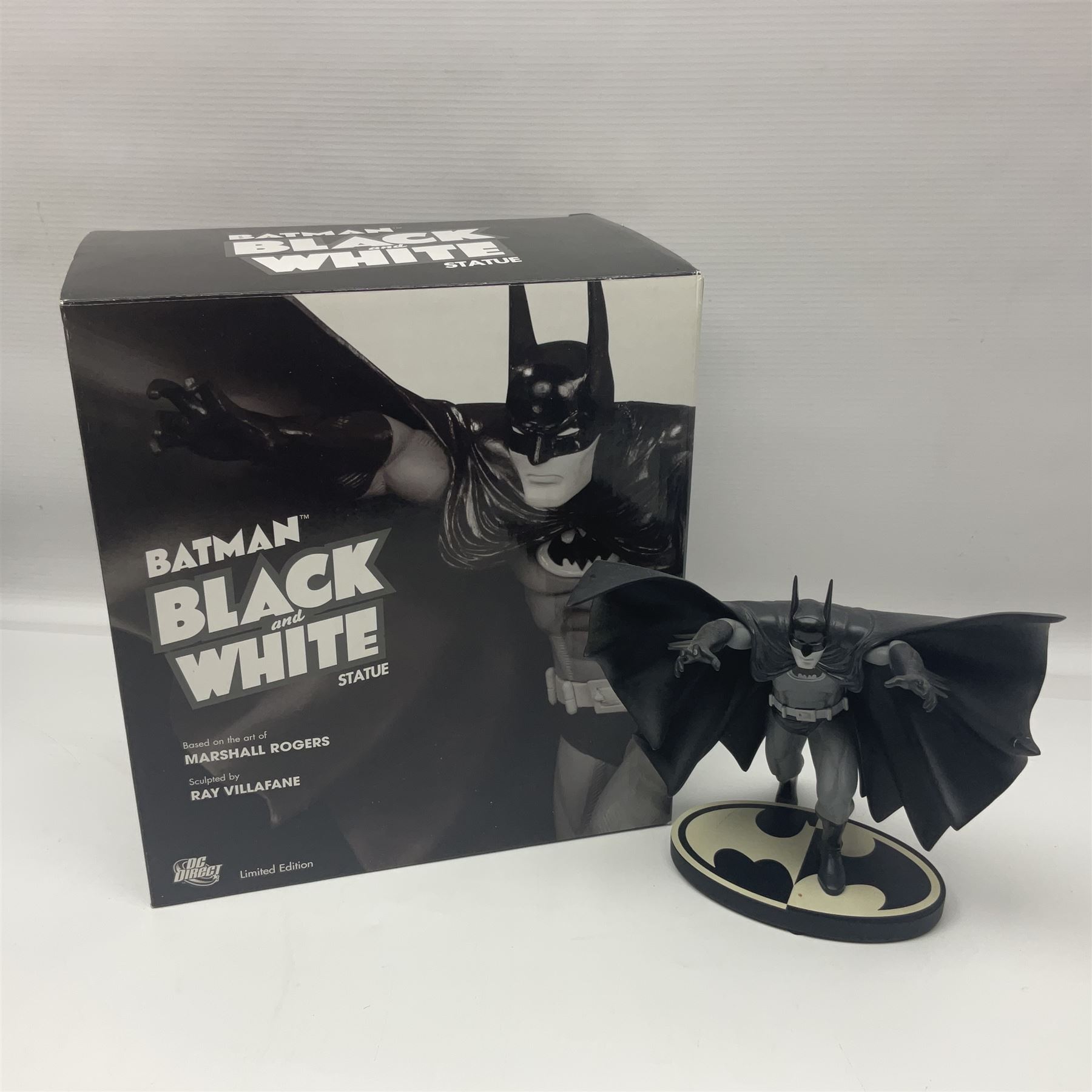 Group of five limited edition DC Direct Black and White Batman hand-painted cold-cast porcelain statues in original boxes, with two similar examples from DC Collectibles 