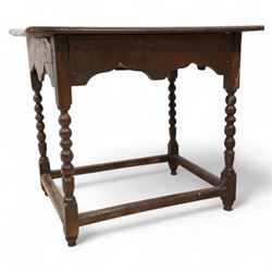 17th century oak side table, two plank rectangular top over single drawer, on bobbin-turned supports united by stretchers 