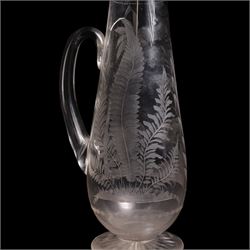 19th/ early 20th century crystal water jug, probably Stourbridge, of baluster form engraved with two Swans on a lake, amongst ferns, reeds and a palm tree, on circular pedestal star engraved foot, H28cm, heavy cut glass jar and cover on pedestal foot, together with a Lalique Samoa frosted glass scent bottle, signed Lalique, France, and labelled 11312 H8cm (3)