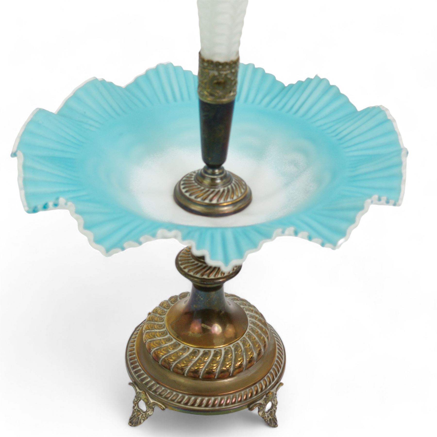 19th/ early 20th century silver-plate and satin glass epergne, having a single frilled blue satin glass trumpet vase with matching bowl beneath, on gadrooned column and base, with scroll bracket feet, H45cm