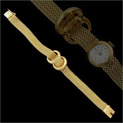 Moviga ladies gold manual wind wristwatch, the watch concealed by knot design cover, on in...