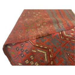 Meshwani crimson ground runner rug, the busy field decorated with four trailing lozenges surrounded by geometric motifs