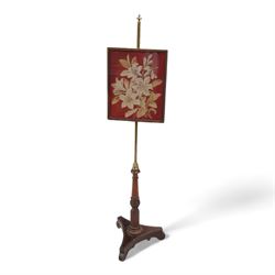 Early 19th century mahogany and brass mounted pole screen, rectangular floral needle work ...