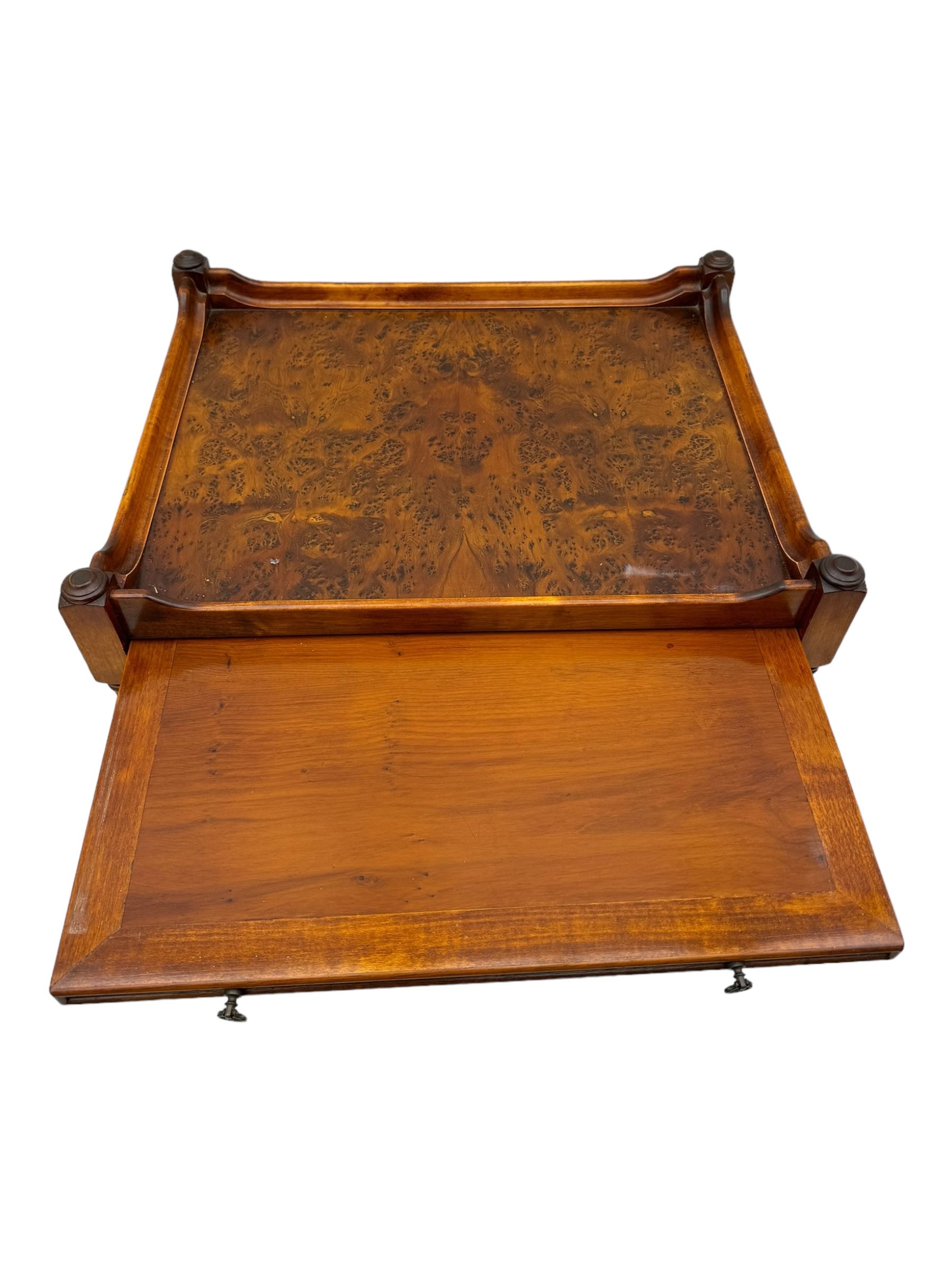 Wade - pair of Georgian design yew wood bedside or lamp tables, each with raised tray top over single shelf, the lower section fitted with two drawers with brass ring handles, raised on turned supports