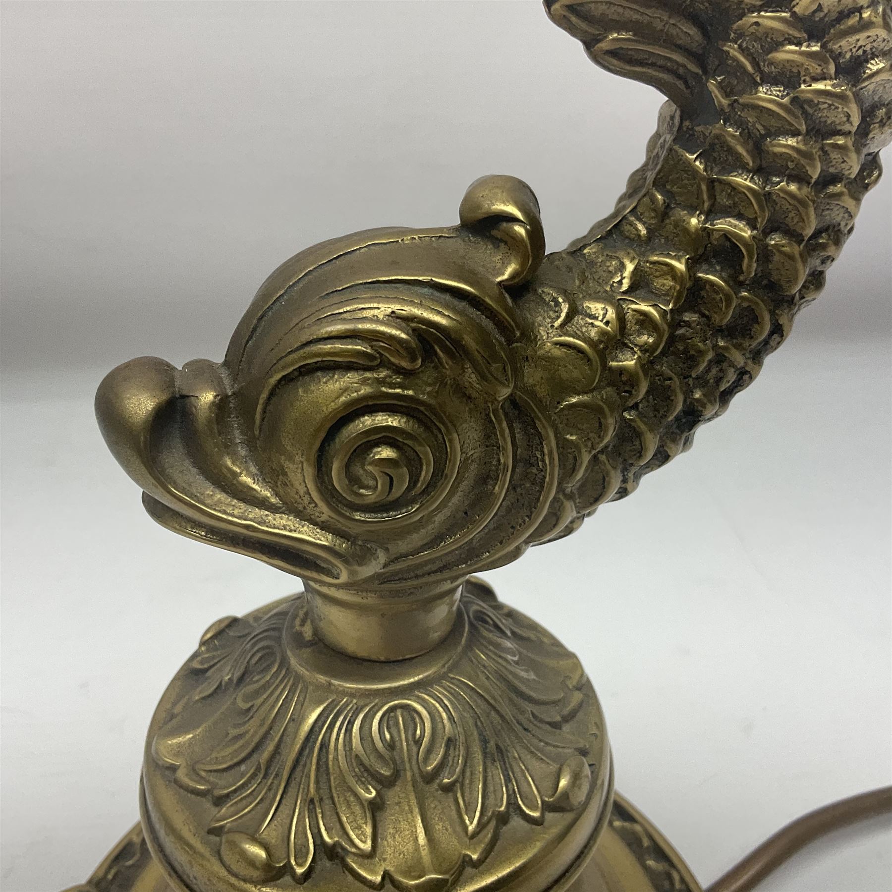  Gilt metal table lamp, in the form of a dolphin, H33cm