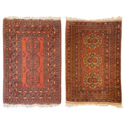 Bokhara red ground rug, the field decorated with three Gul motifs, within multiple borders...