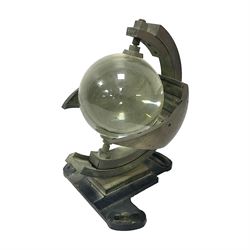 Sunshine recorder by Casella London, No 5997, a glass sphere mounted into a curved brass p...