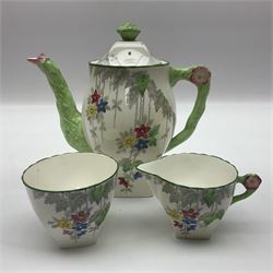 Art Deco Delphine China coffee service for six, comprising coffee pot, open sucrier, milk jug, cups and saucer, with floral decoration