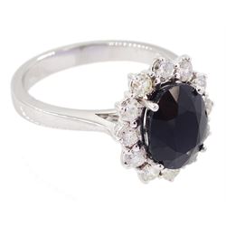 18ct white gold oval cut sapphire and round brilliant cut diamond cluster ring, hallmarked, sapphire approx 2.60 carat, total diamond weight approx 0.55 carat