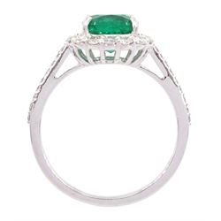 18ct white gold cushion cut emerald and round brilliant cut diamond cluster ring, stamped 750, emerald approx 1.85 carat, total diamond weight approx 0.55 carat