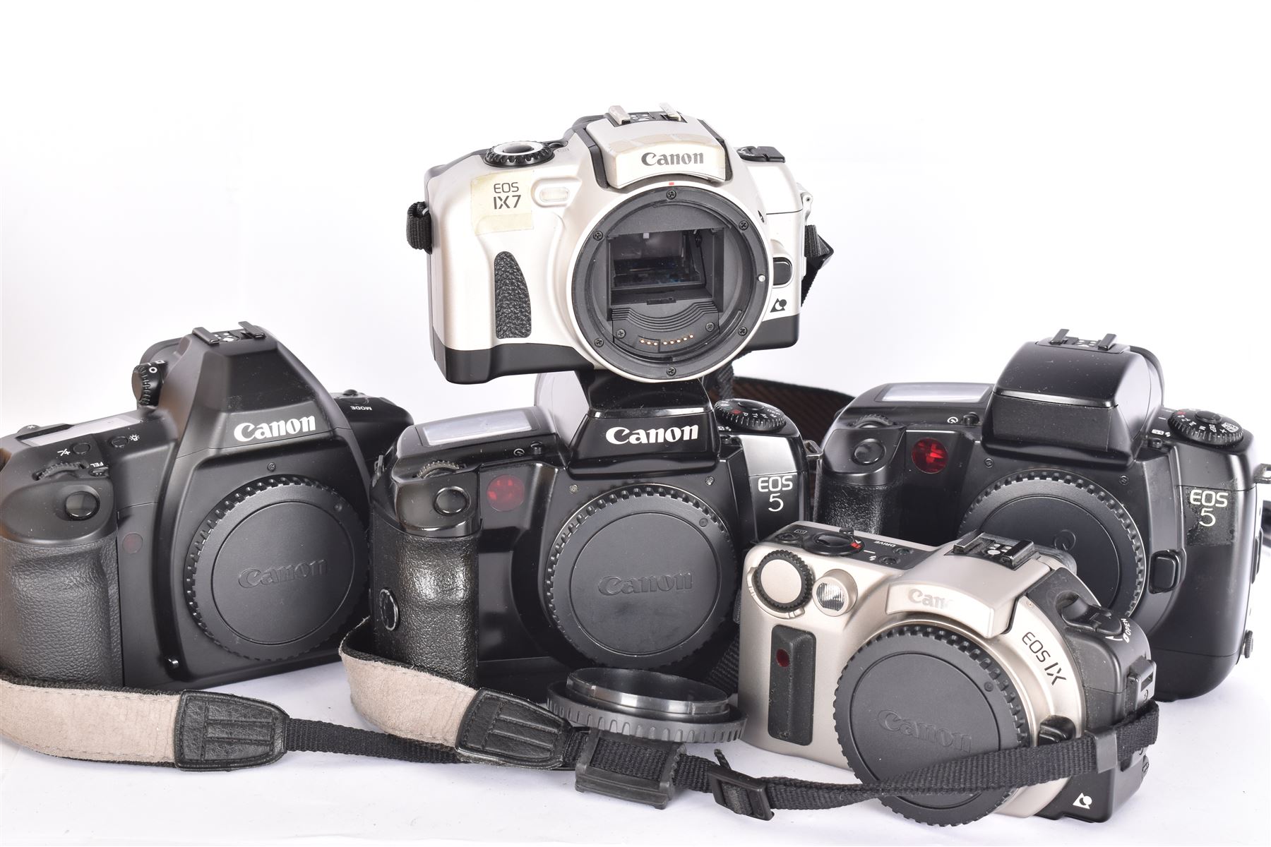 Five Canon EOS camera bodies, comprising EOS IX serial no. 0306280, EOS IX7 serial no. 1505354, EOS 3 serial no. 2743904, and two EOS 5 examples, serial nos. 1096604 & 9701653