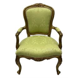 Late 20th century French design gilt framed armchair, upholstered in lime green damask fabric, arched back with carved crest, scroll arms, serpentine front rail, on cabriole front supports with ball feet