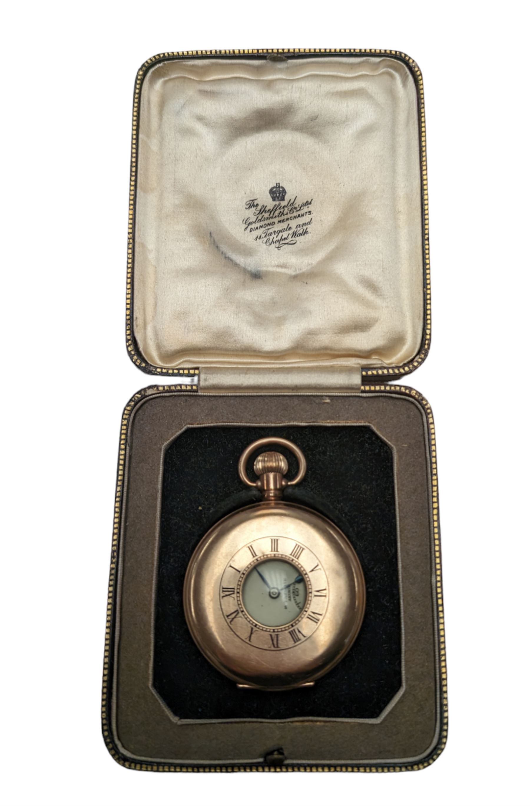 Gold plated half hunter pocket watch, the white enamel dial inscribed The Sheffield Goldsmiths Co. Ltd, with subsidiary seconds dial, the case marked Dennison Watch Case Co Ltd, boxed 