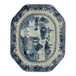 Six 18th century Chinese Export blue and white platters, each of rectangular canted form decorated with various landscape scenes, within foliate borders, max L45cm (6)