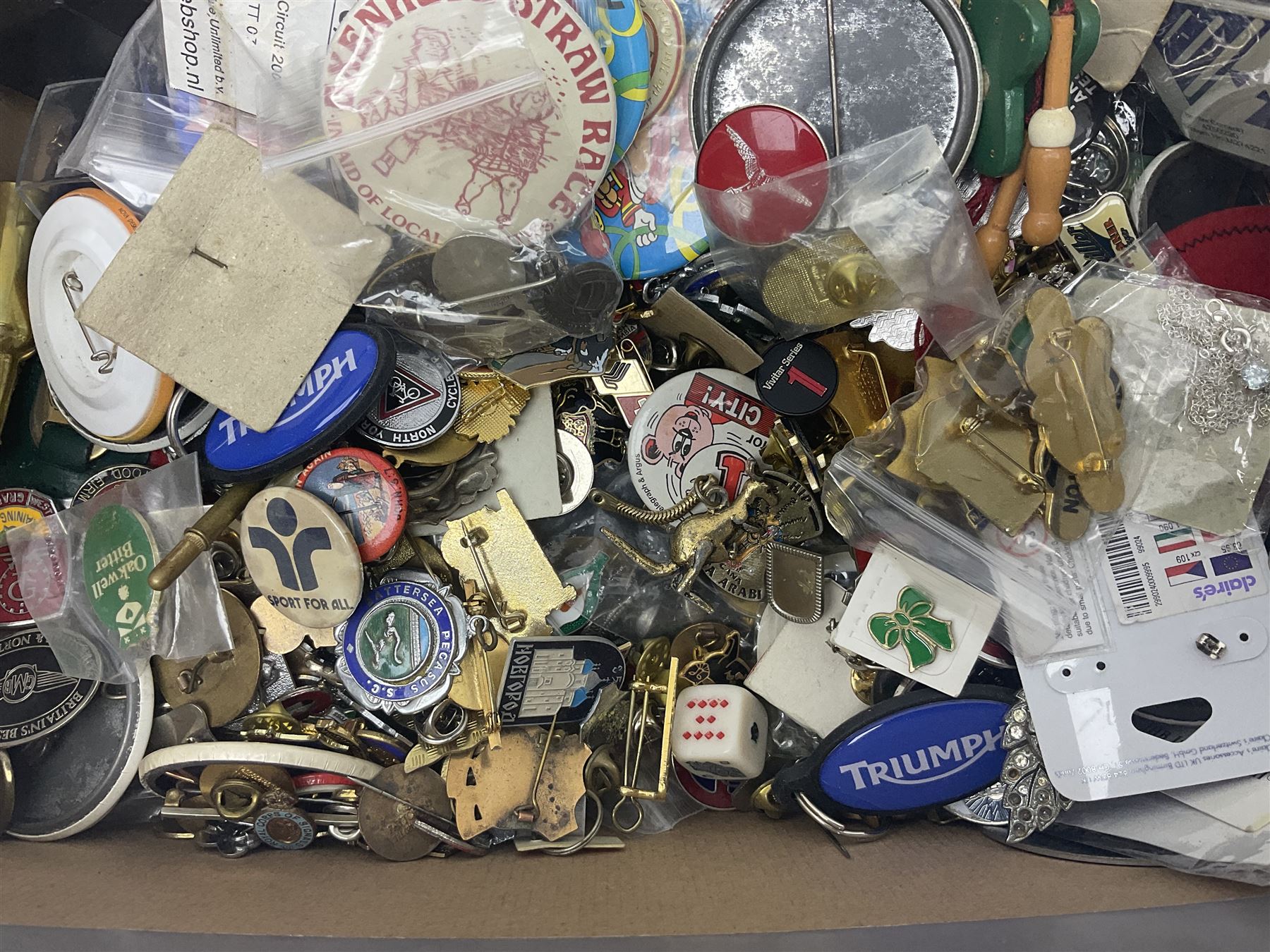 Four silver badges, military cap badges and a large collection of enamel badges, pin badges, plastic badges, brooches etc, including Disney examples