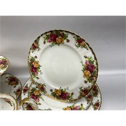 Royal Albert Old Country Roses pattern coffee service for six, comprising coffee pot, milk jug, cups and saucers, cake plate, together with miniature teapot, six teacups and saucers, six dinner plates, six side plates etc 