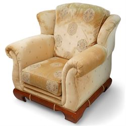 Three-seat sofa (W197cm, D103cm) and pair of matching armchairs (W100cm); upholstered in pale gold fabric decorated with Gul motifs, hardwood framed with polished base