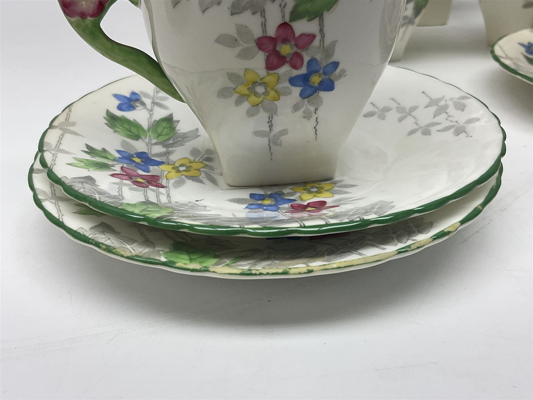 Art Deco Delphine China coffee service for six, comprising coffee pot, open sucrier, milk jug, cups and saucer, with floral decoration