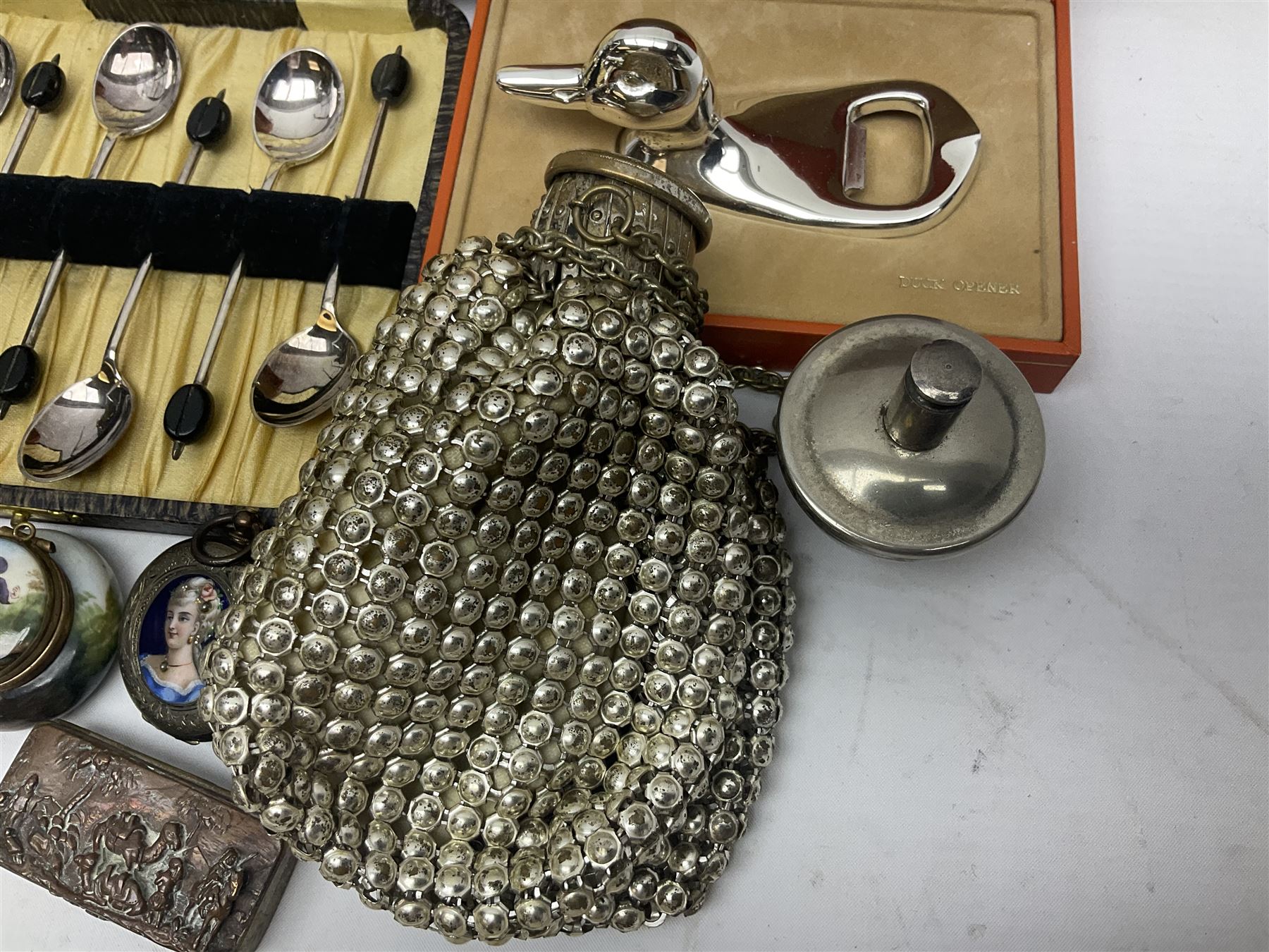 Saint Hilaire duck bottle opener, five silver plated knives/forks with silver ferrules, copper trinket box, silver plated concertina beaded bag and other collectables