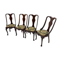 Set of eight late 19th century mahogany spoon back dining chairs, each with shaped top rail over Queen Anne design vase-shaped splat, upholstered seats in floral patterned fabric, raised on cabriole supports with scroll carved knees