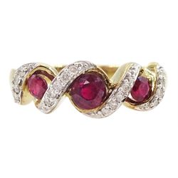 9ct gold three stone ruby and diamond crossover ring, hallmarked