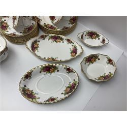 Royal Albert Old Country Roses pattern part tea and dinner service, to include two tureens, eight dinner plates, six side plates, twelve bowls, two mugs, seven teacups and saucers, milk jug,  twelve cake plates, six soup bowls and saucers, candlesticks, etc (95)