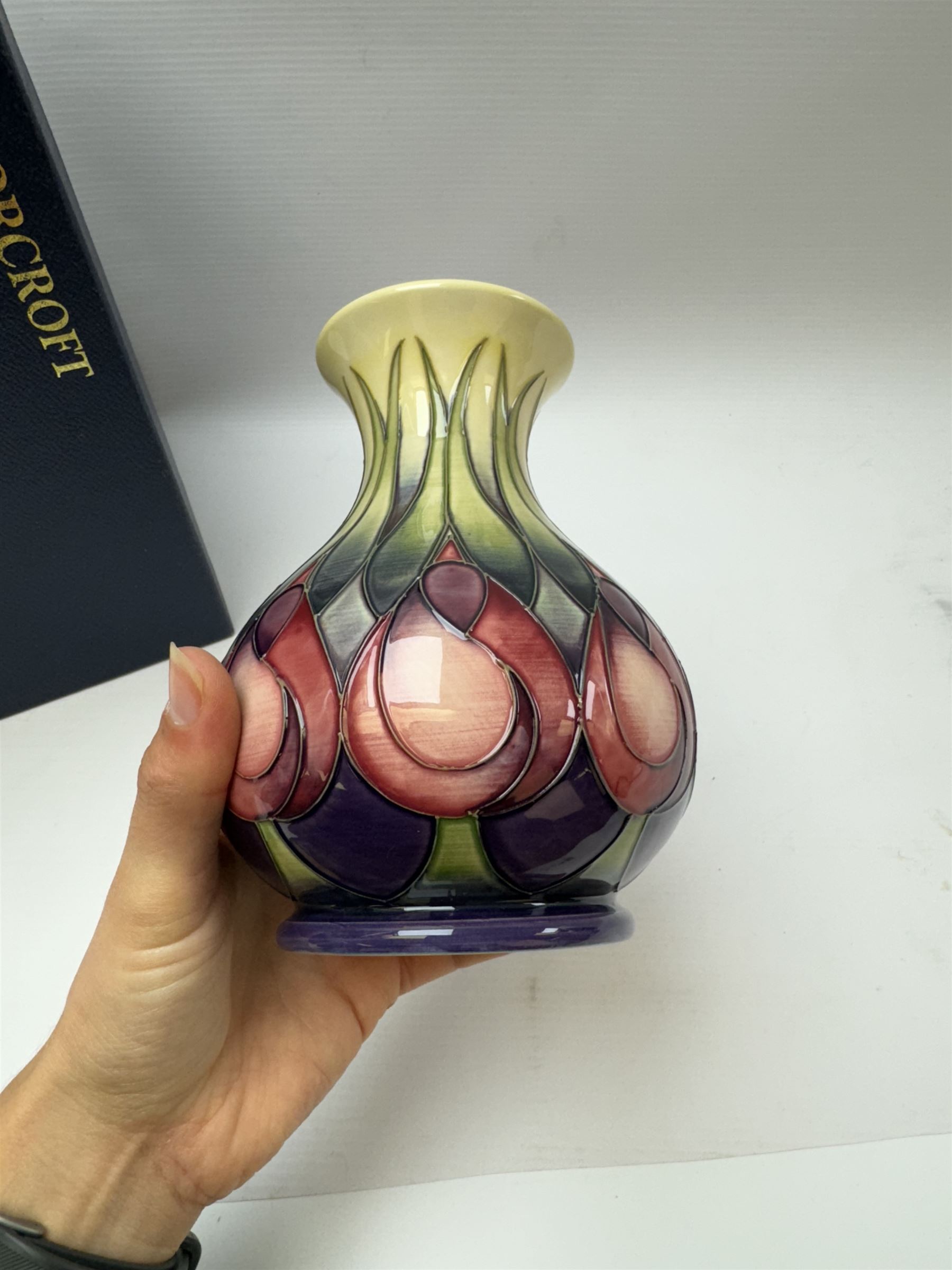 Moorcroft vase, decorated in April Tulip pattern, with markers mark beneath, with original box H16cm