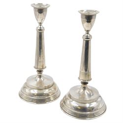 Pair of late 19th/early 20th century Austro-Hungarian 800 standard silver candlesticks, wi...