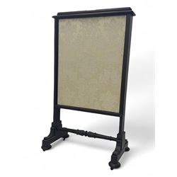 Early 19th century mahogany fire screen, upholstered in cream foliate pattern fabric, pull...