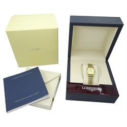 Longines La Grand Classique ladies gold-plated and stainless steel quartz wristwatch, Ref. L4 205 2, champagne dial with baton hour markers, boxed with guarantee card dated 2009 and additional links