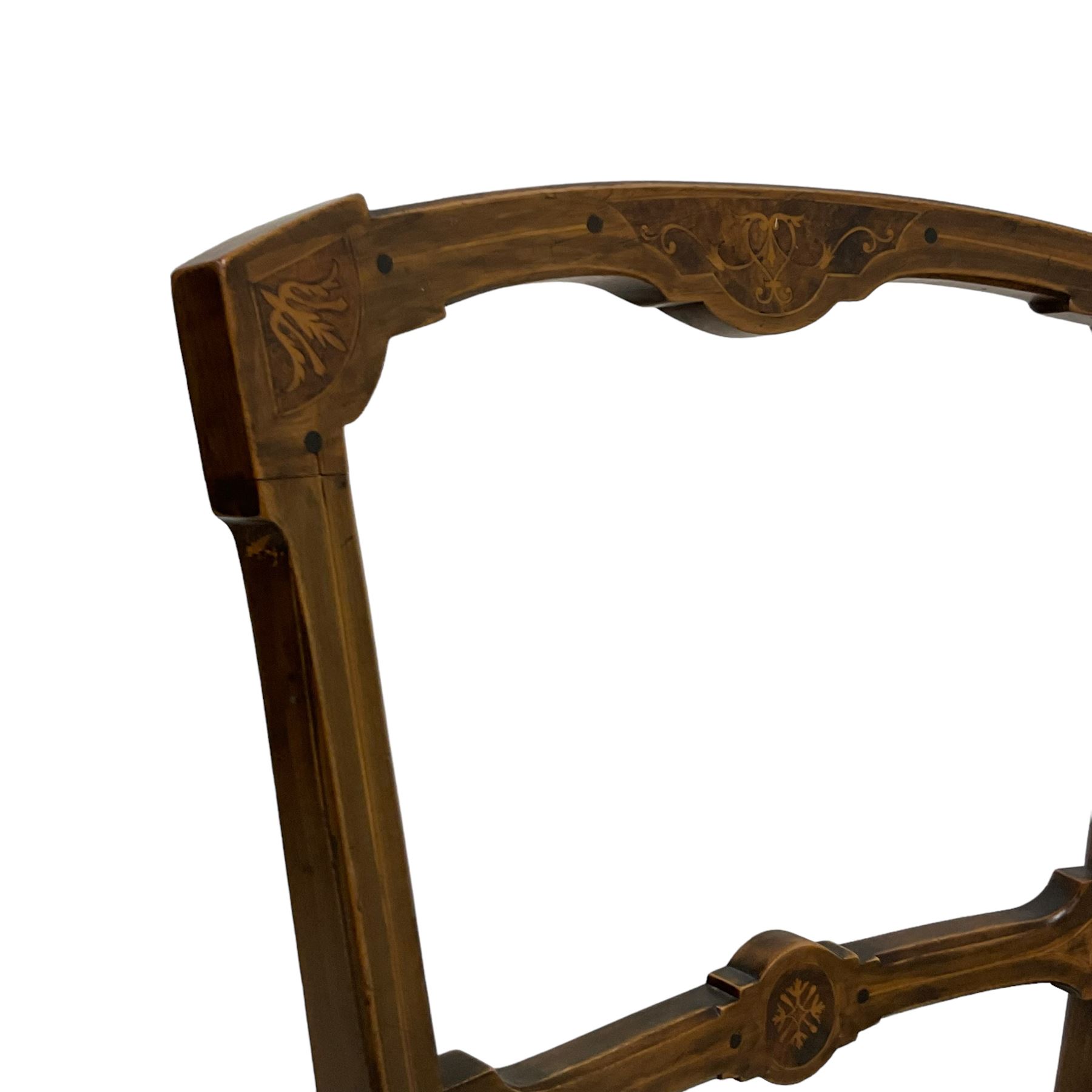 Set of five Victorian Aesthetic Movement inlaid walnut dining chairs, cresting rail and centre bar decorated with scrolling foliate inlays, raised on turned tapering supports with satinwood stringing