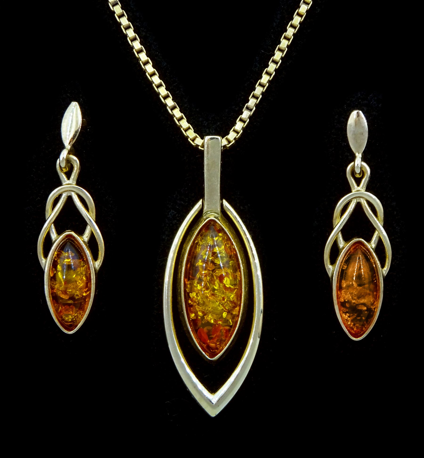 Gold marquise amber shaped pendant, on box link chain necklace and a pair of gold marquise shaped amber Celtic design pendant stud earrings, all hallmarked 9ct