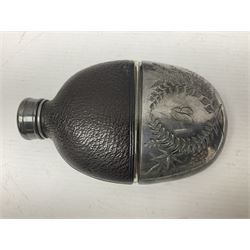 Silver plated glass and pressed leather hip flask, with swivel cap and removable cup, together with a similar oval example, engraved with wreath and initial B, tallest H16.5cm