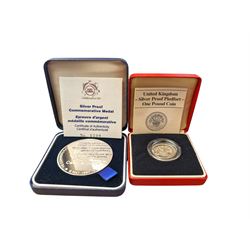 Royal Mint United Kingdom Silver Proof Piedfort one pound coin and a Royal Mint Silver Pro...