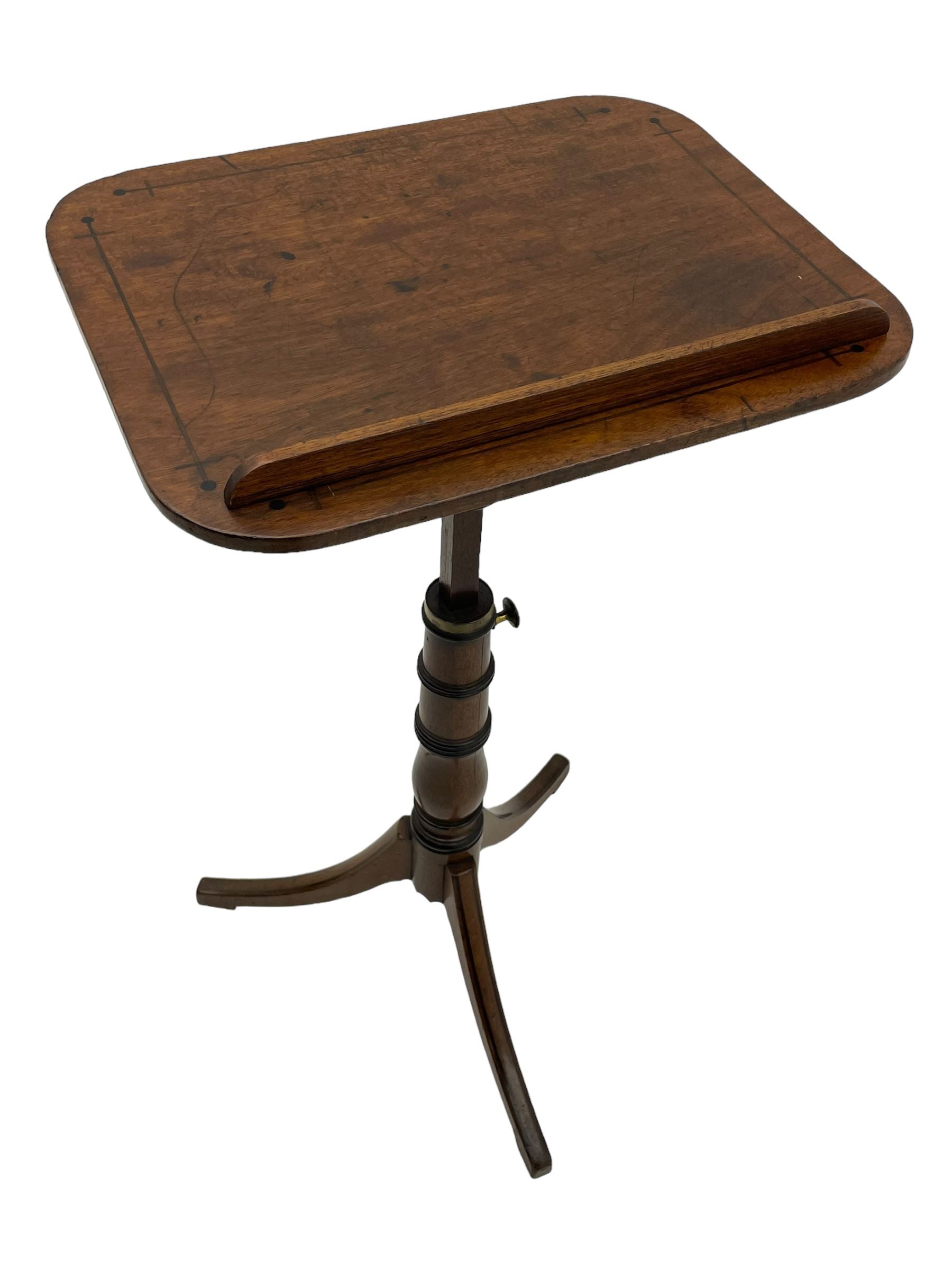 Regency mahogany reading stand, rectangular top with rounded corners on adjustable hinged mechanism, collar turned column on three out-splayed supports, inlaid with ebony stringing 