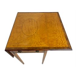 Mid-to-late 20th century Sheraton style satinwood Pembroke table, the drop leaf top with segmented veneers and central oval panel with ebony stringing, crossbanded in rosewood and with edge moulding, single short drawer to one end and faux drawer to other, square tapering supports