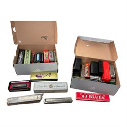 Large collection of harmonicas, including examples by Ridley's, BJ Blues, The Bandmaster, ...